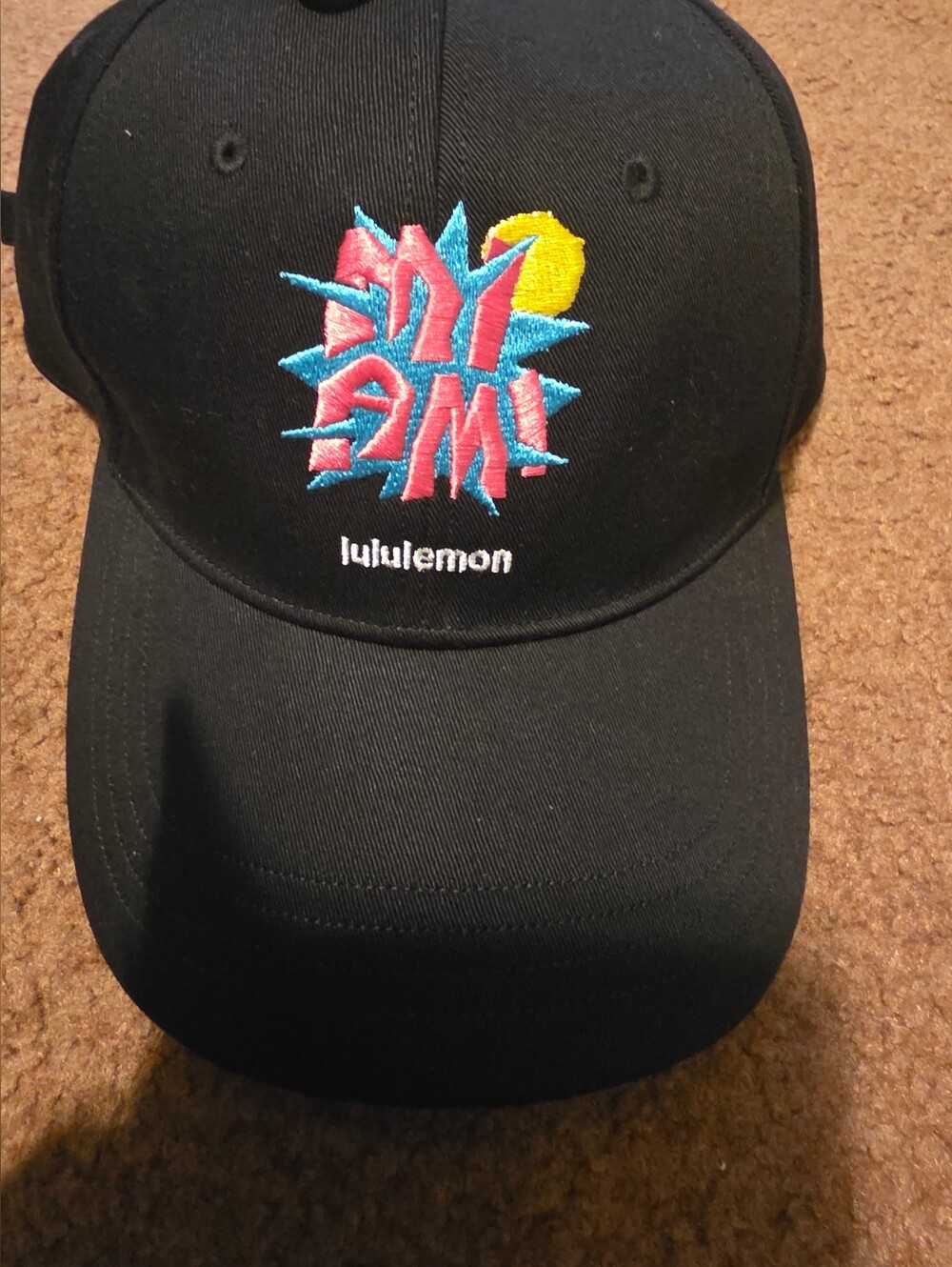 NWT- lululemon athletica Women’s Black Hat with Blue & Pink Graphic